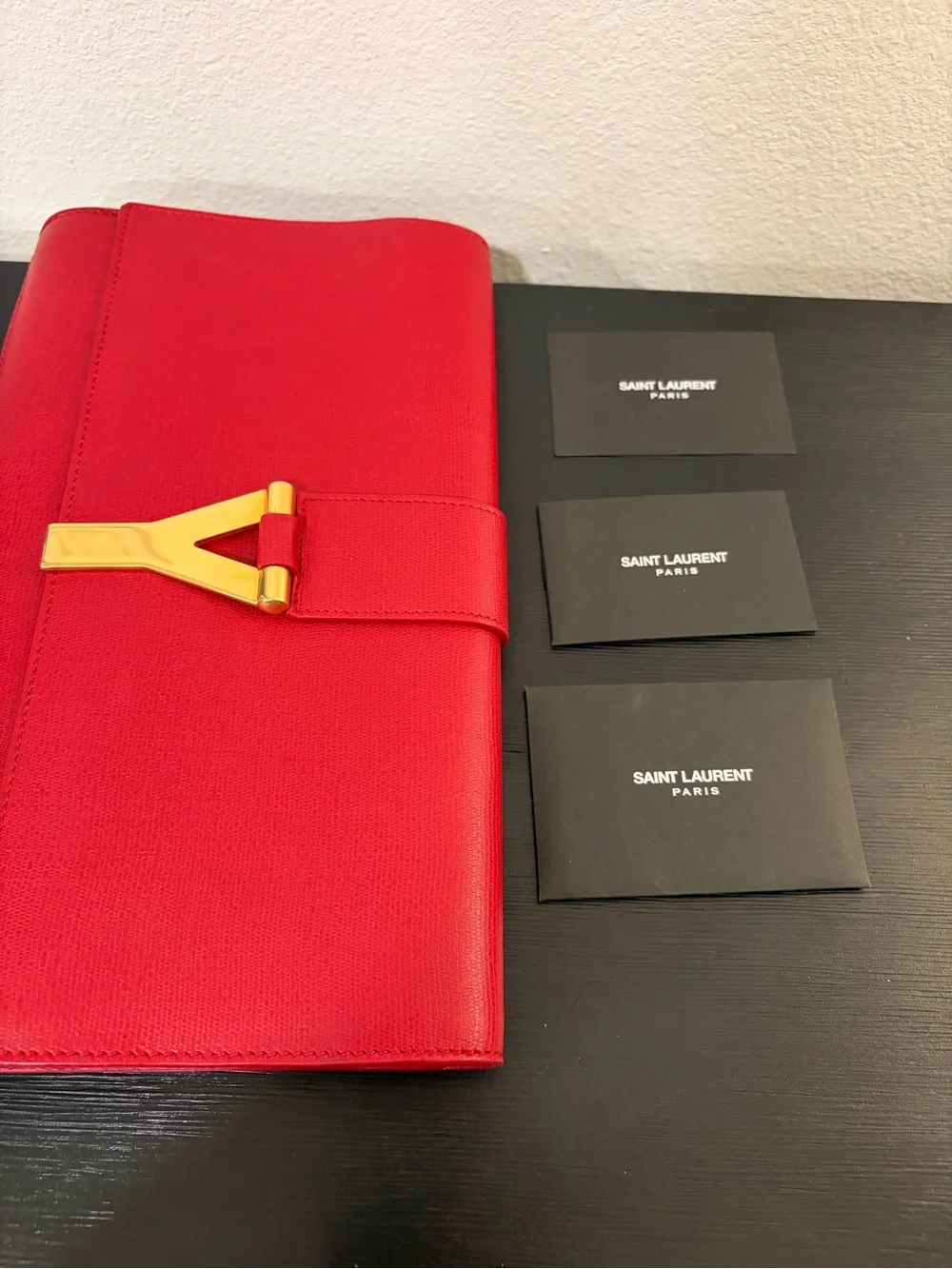 Yves Saint Laurent Leather Clutch in Red